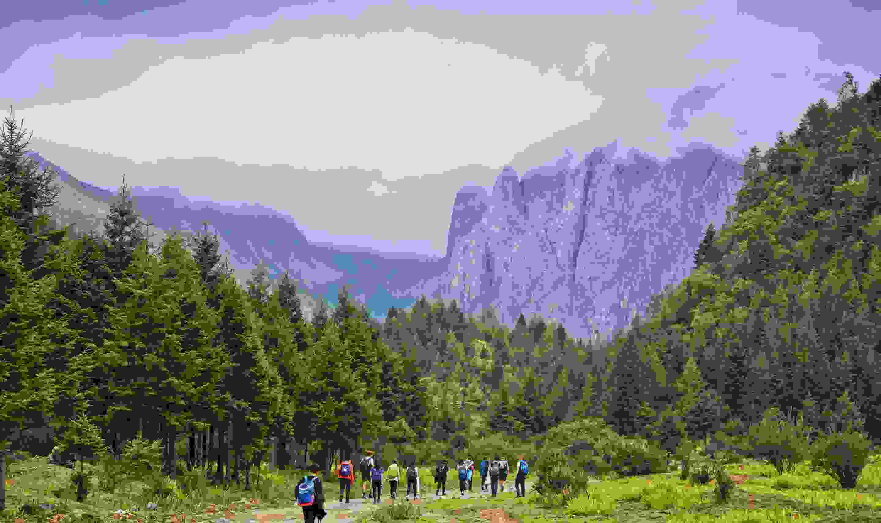 Hiking group with mountains